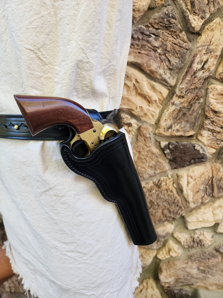 Close up of the holster on our replica of Wild Bill Hickok's holster tooled and styled to fit the rest of the rig, holstered is a 1873 Colt Peacemaker.