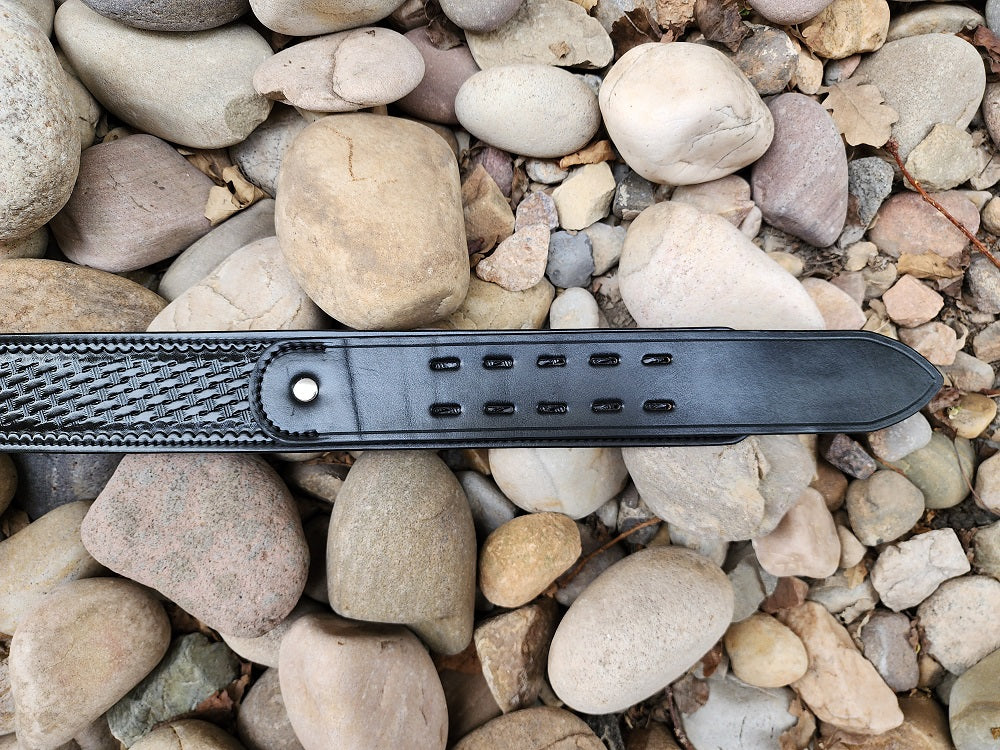 Close up on the buckle loop end of the belt, made to fit a double pronged buckle.