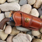 Western holster with ranger star in brown leather and antique brass accent