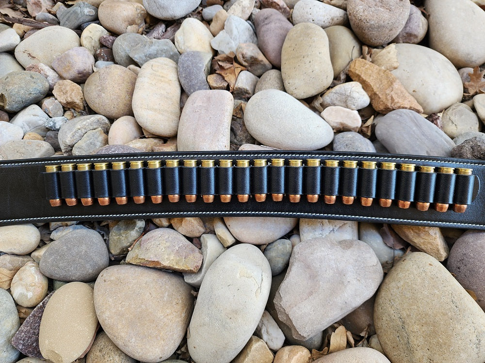The image portrays the middle of the Angel Eyes gun rig which is where the twenty four bullet loops are, each bullet loop has one brass bullet.
