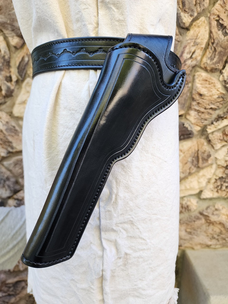 Close up of the holster on our replica of Wild Bill Hickok's gun rig, the holster is styled and tooled to match the belt.