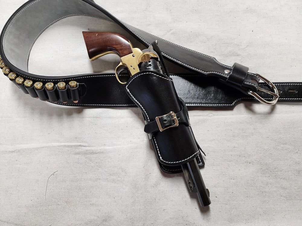 View focusing on the black leather holster of the Angel Eyes rig. The holster is a right hand cross draw. Also visible is the suede interior of the belt and nine bullet loops.