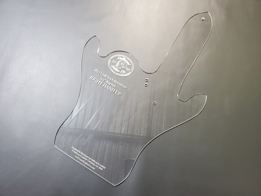 Clear cast high quality acrylic holster template sits on a gray background