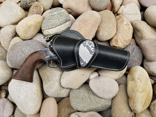 Black western holster with gray python skin inlaid into the rounded collar.